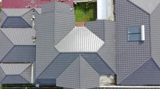 Why Metal Roofs Are Noisier: Comparison with Concrete and Clay Tiles